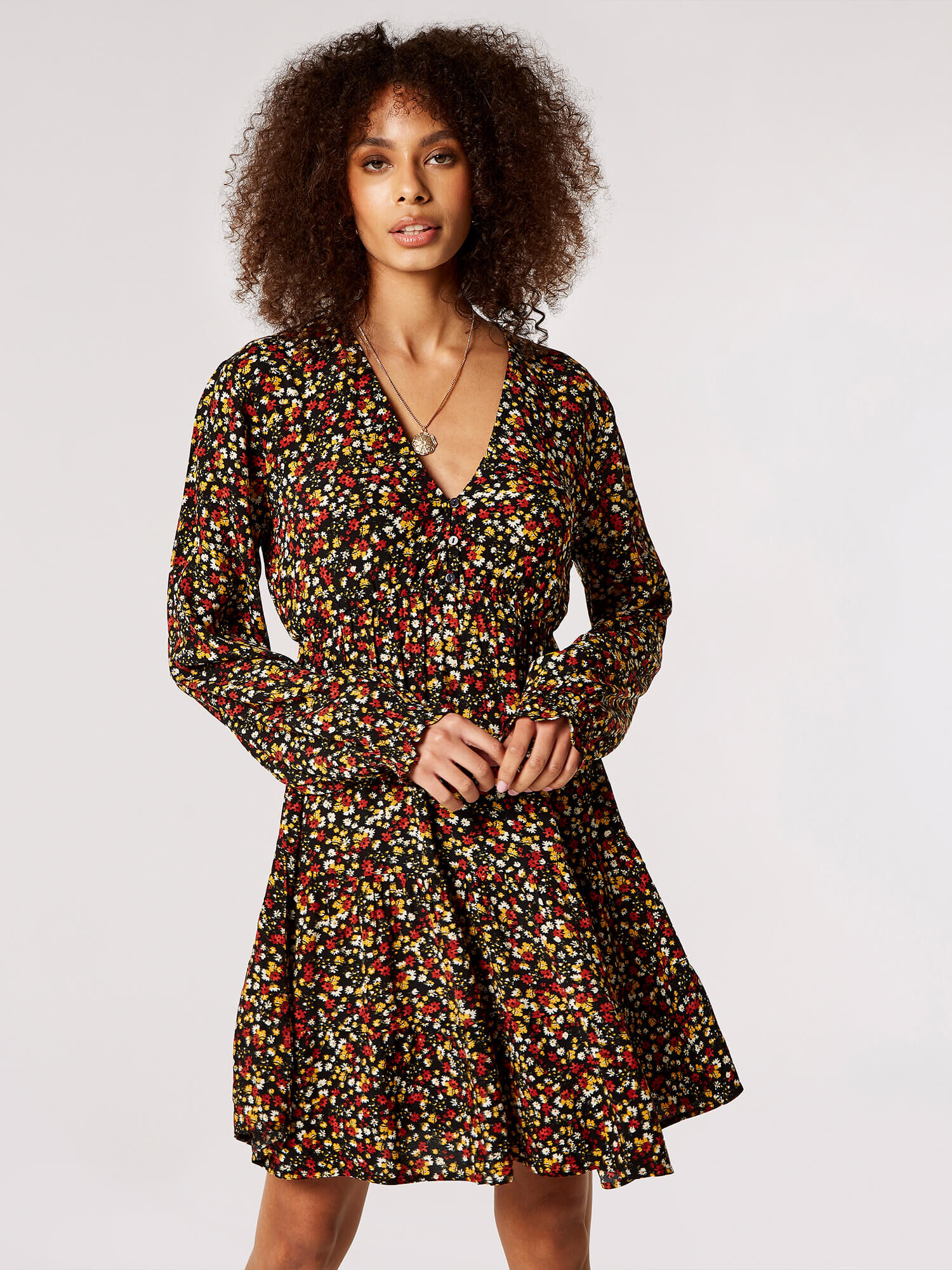 Black floral tiered dress top