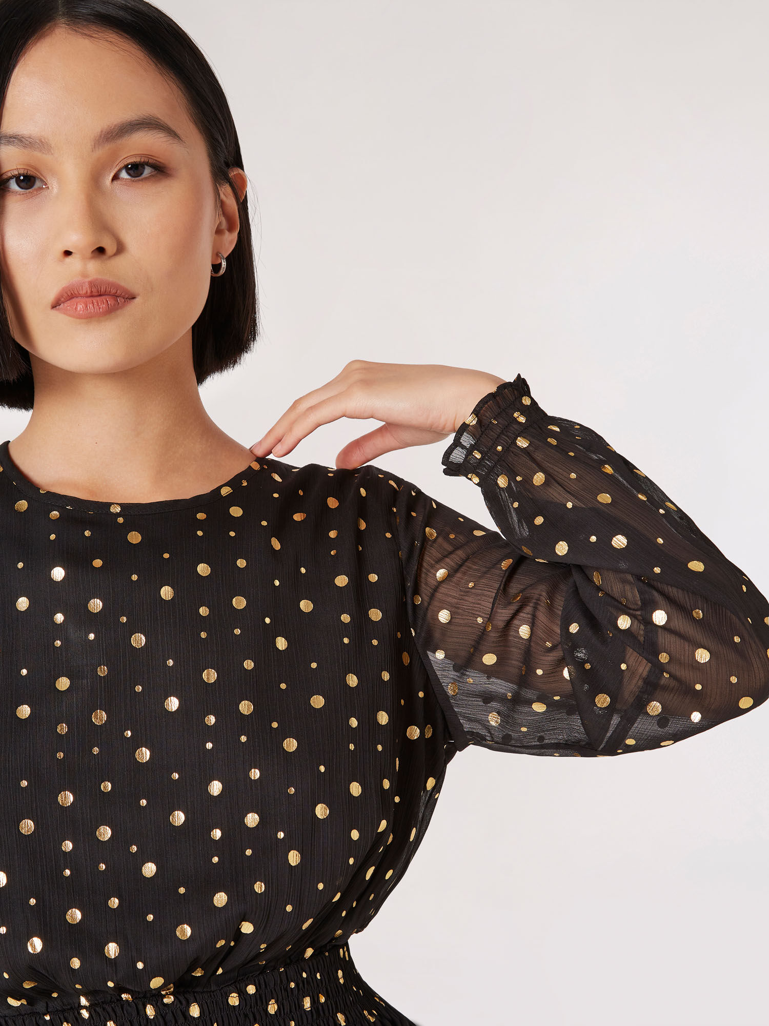 Black gold polka dot dress deals