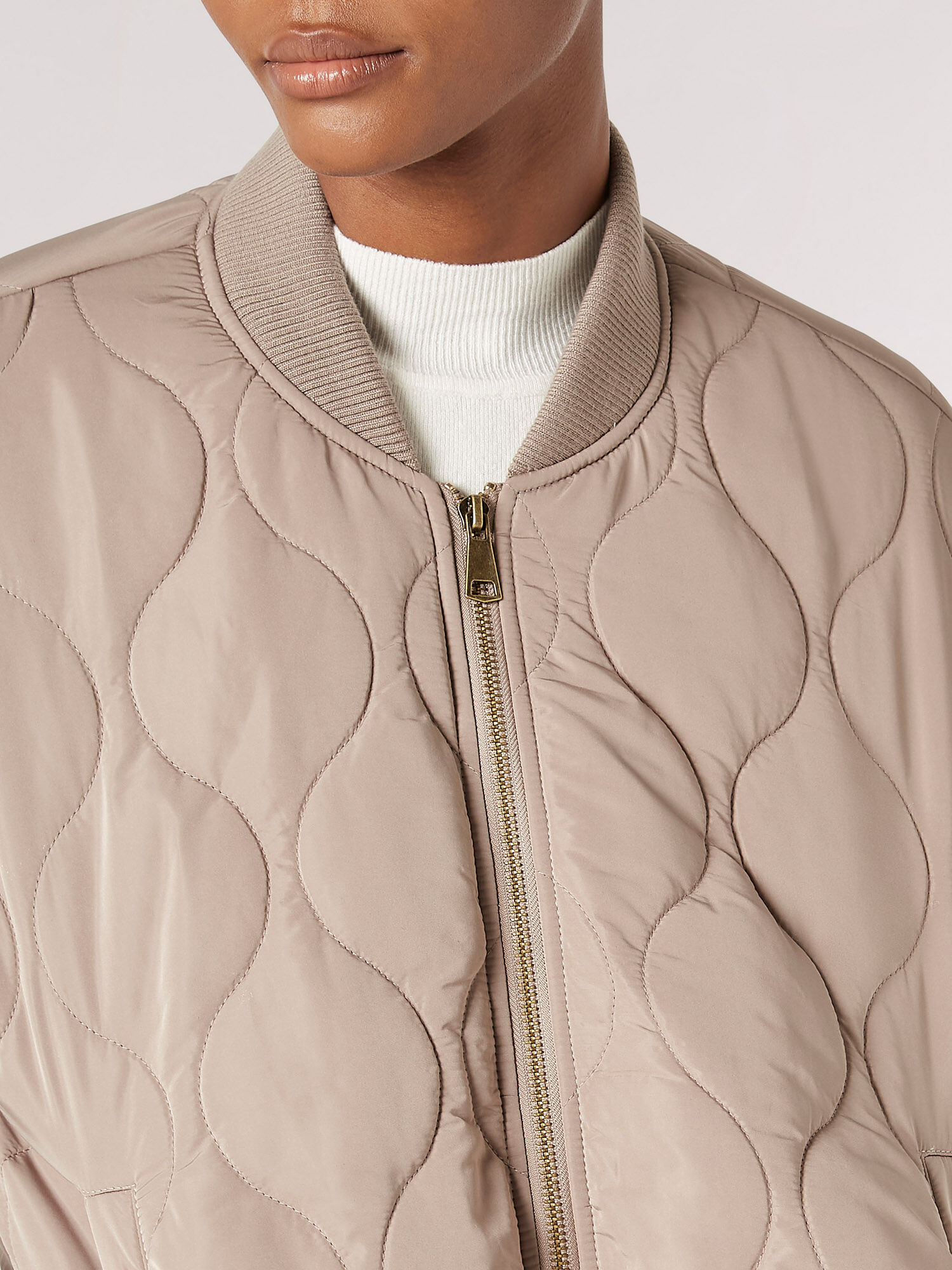 Top paw quilted bomber jacket top