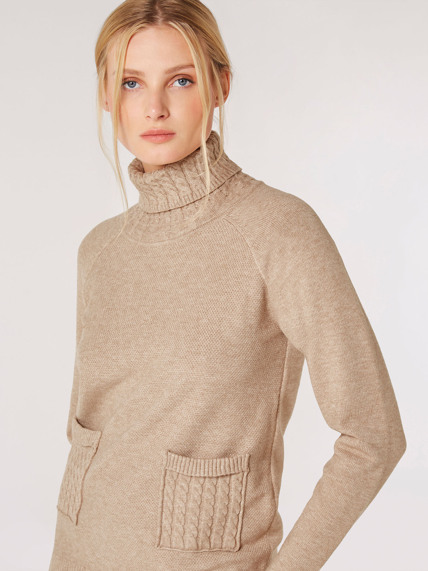 Aran roll neck jumper sales
