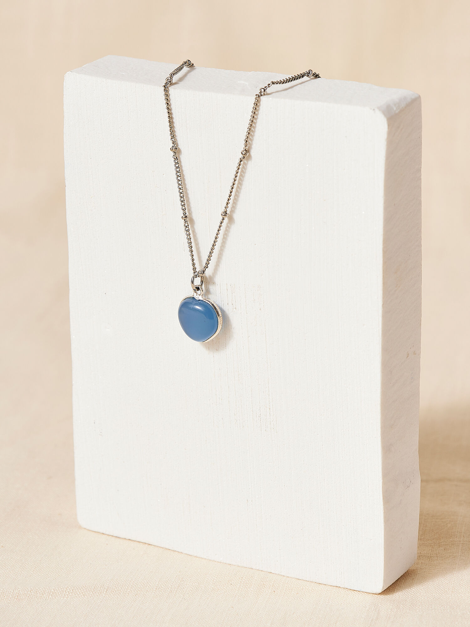 Silver chain with sales blue pendant