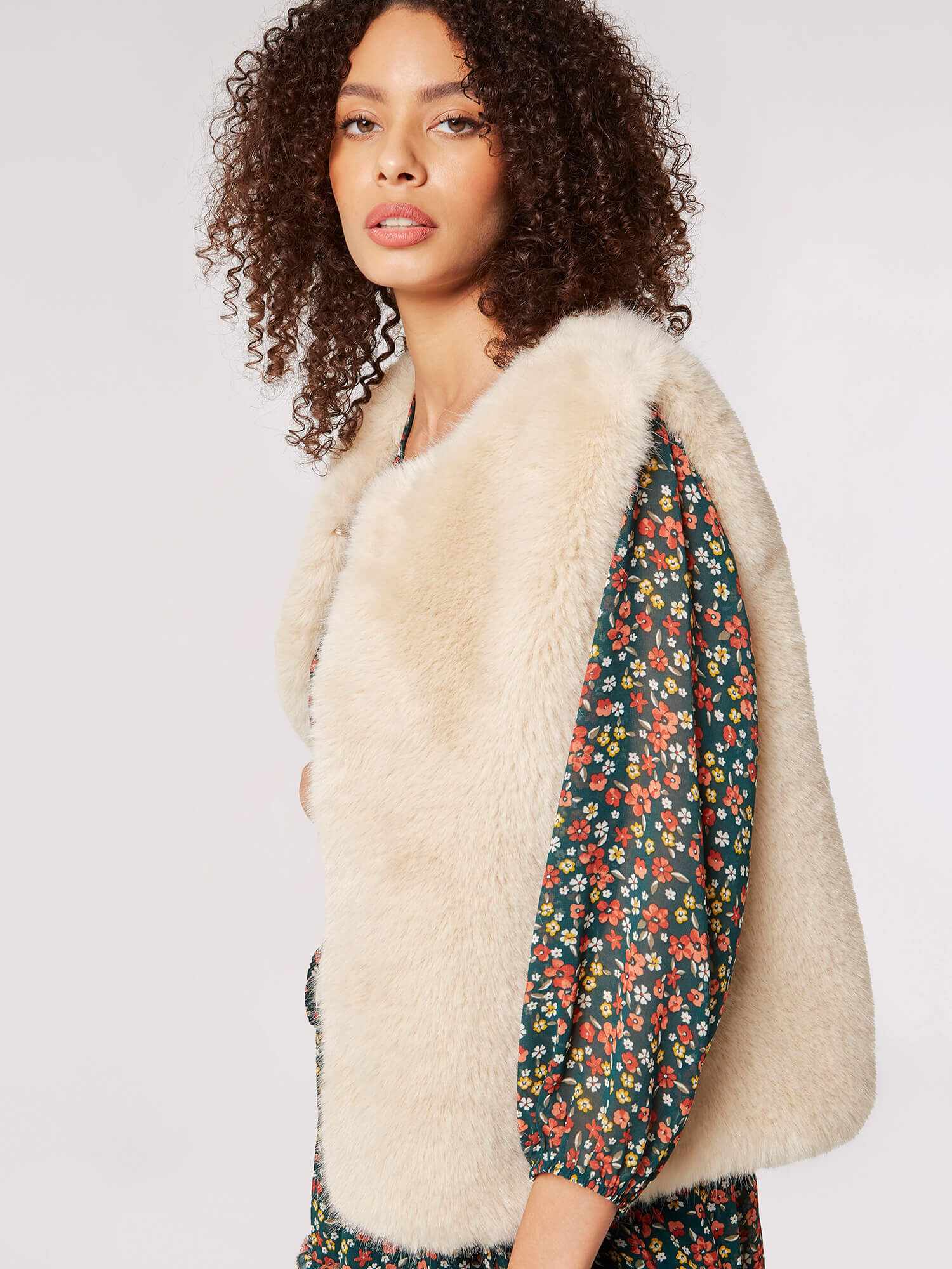 Cropped faux outlet fur gilet
