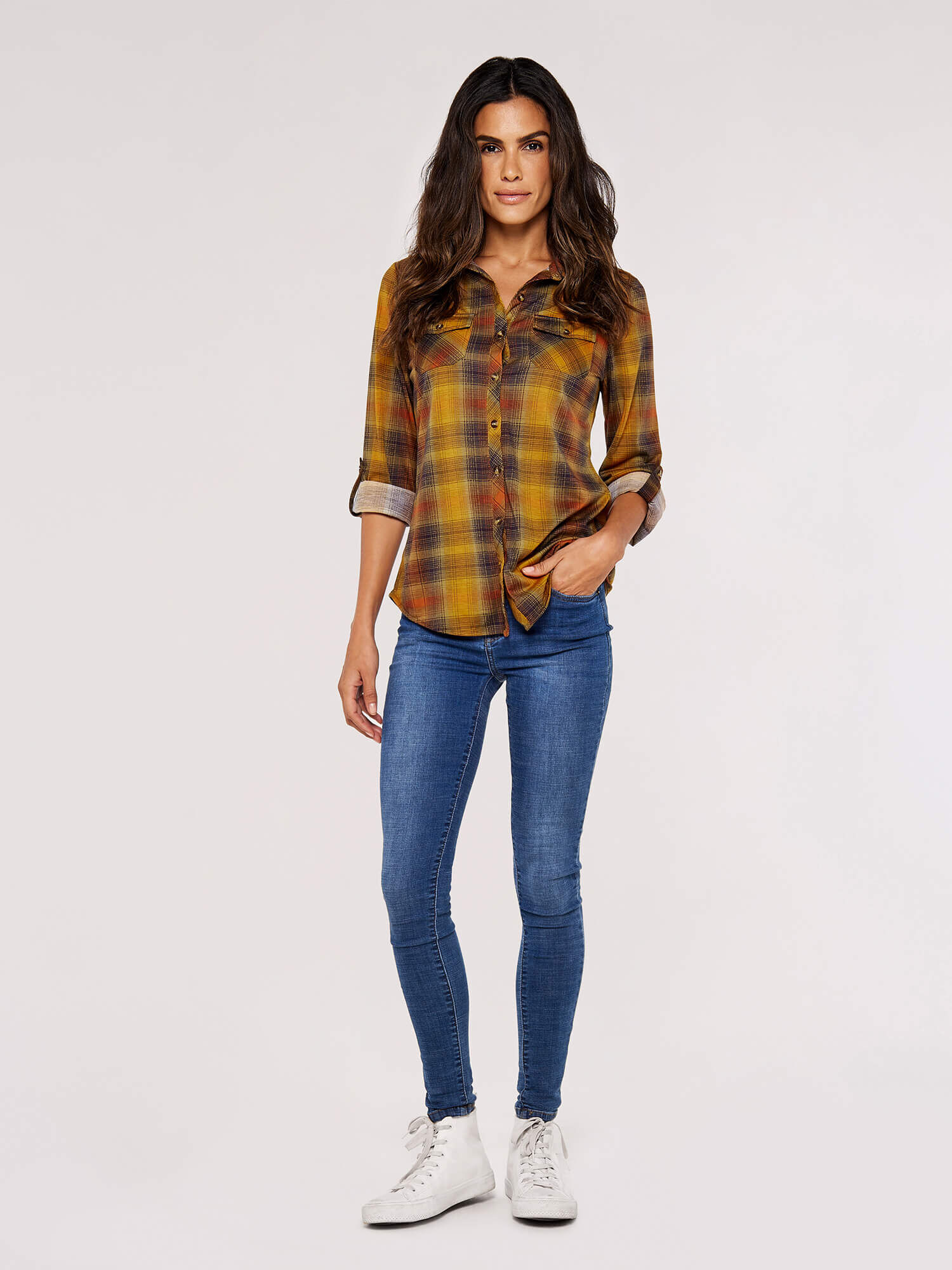 Checked shirt outlet with jeans