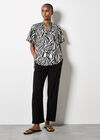 Zebra Swirl Tassel Tie Ruffle Top, Black, large