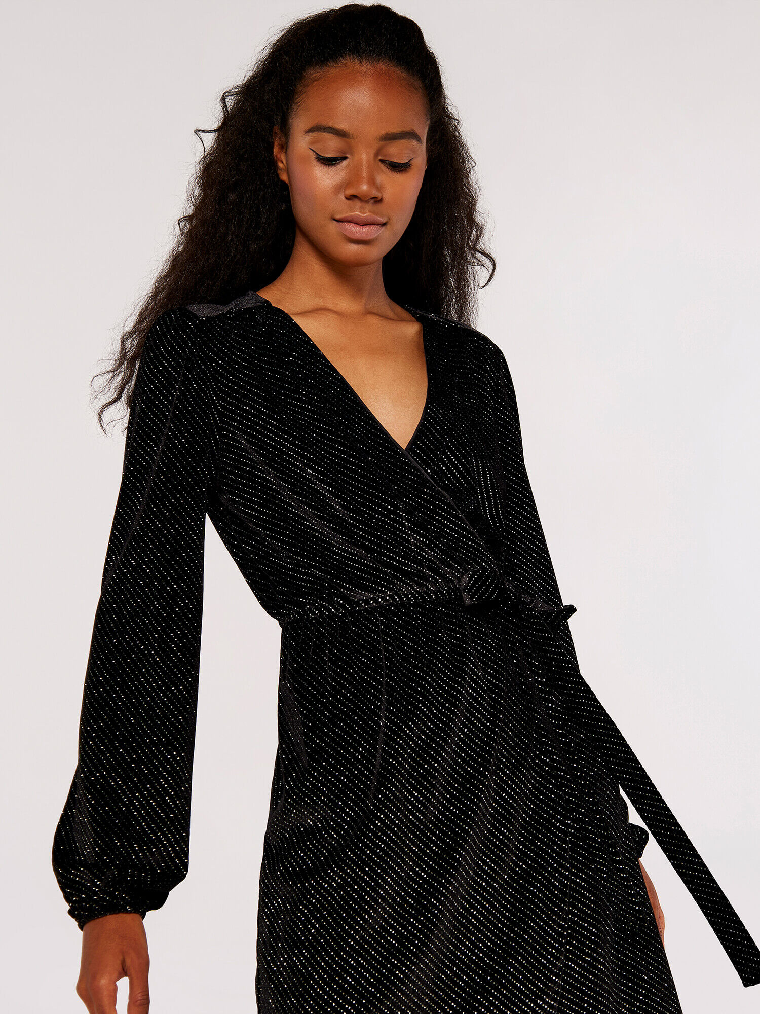 Black polka dot wrap dress top