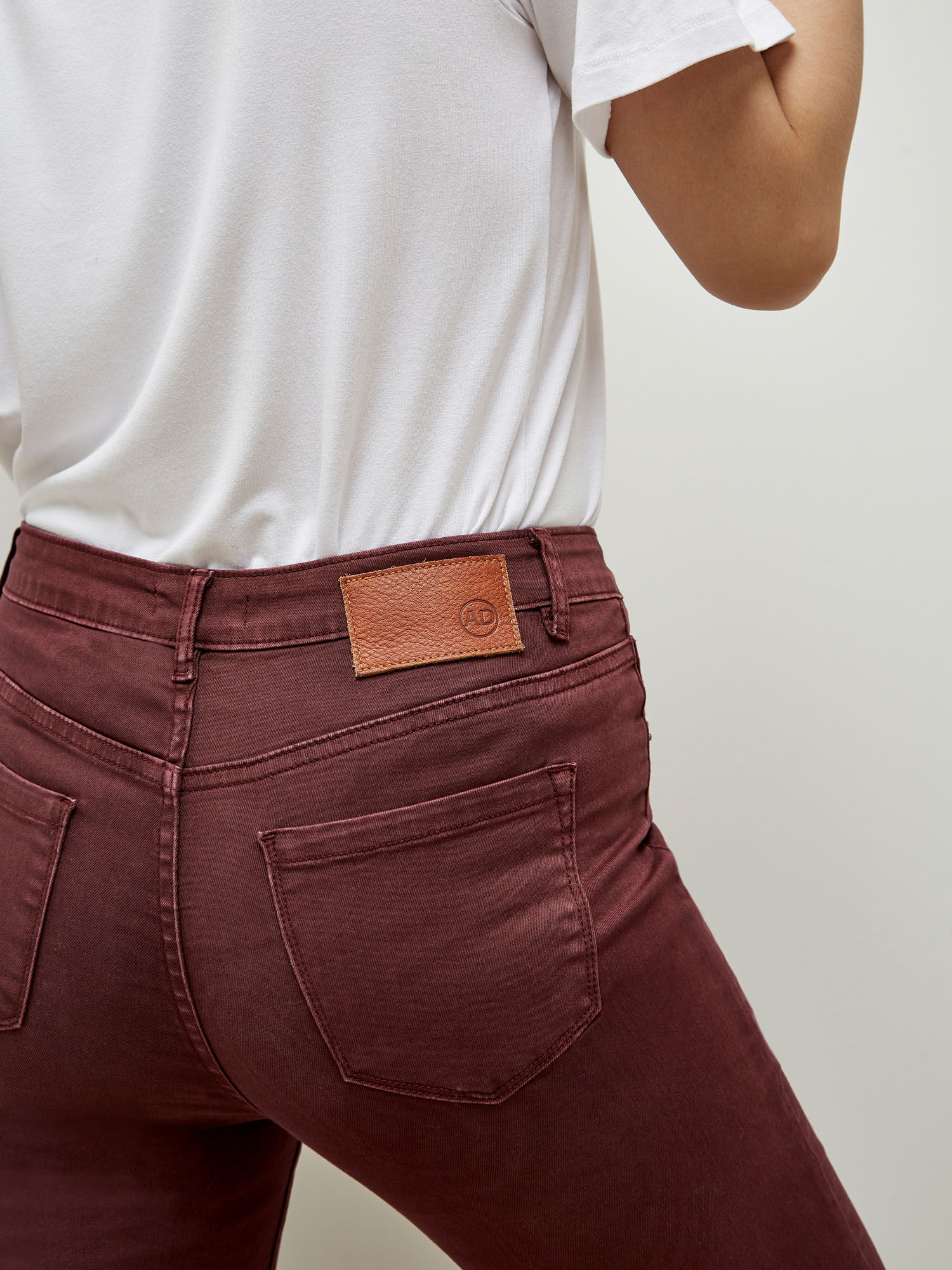 Maroon ripped jeans sale