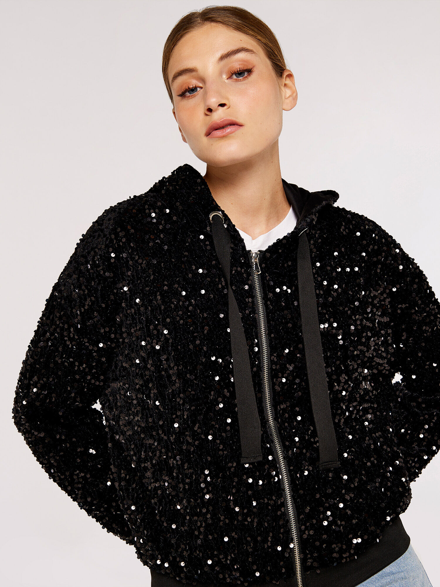 Black sequin bomber top