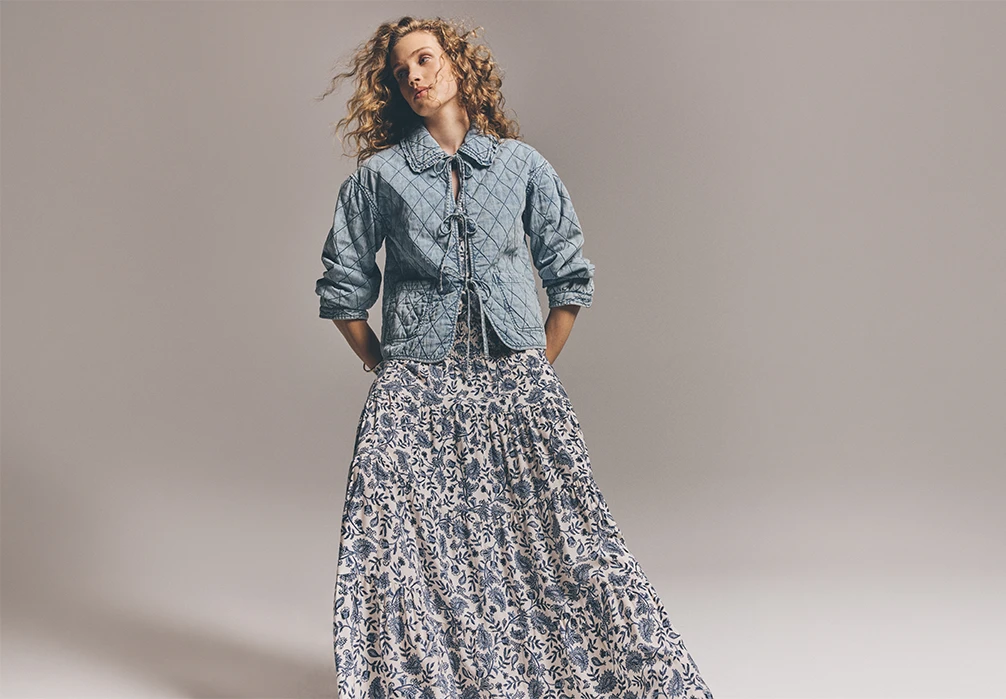 Model wearing the Painterly Paisley Tiered Maxi Skirt