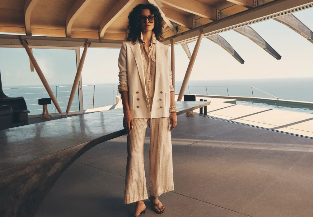 model wearing the Pinstripe Linen Blend Wide-Leg Trousers